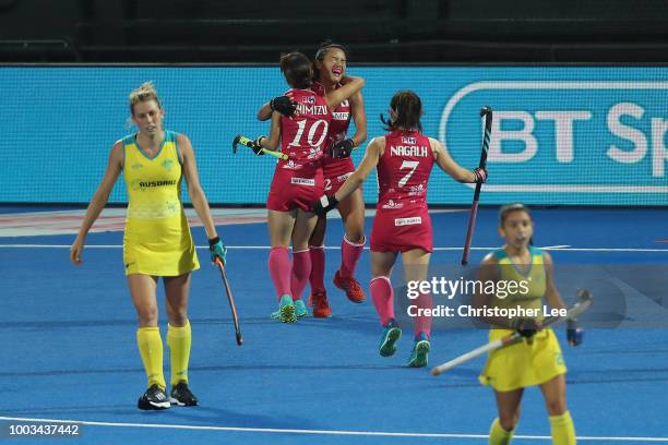 Motomi Kawamura of Japan celebrates scoring their first goal during the Pool D game between Australia and Japan of the FIH Womens Hockey World Cup at...