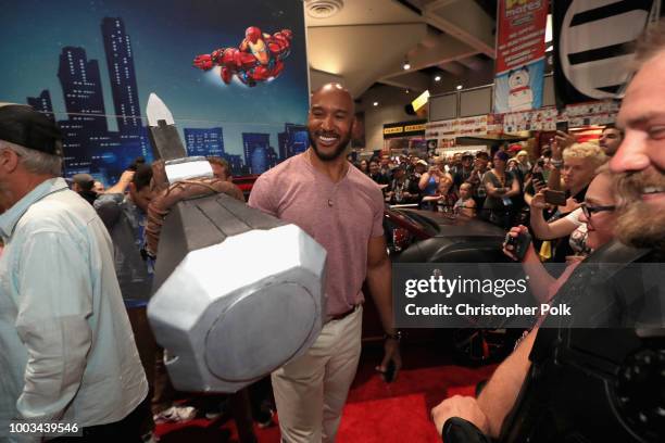 Henry Simmons of Marvel's Agents of S.H.I.E.L.D. Stops by the Marvel booth to pose with the Hyundai Kona Iron Man Edition at San Diego Comic-Con 2018...