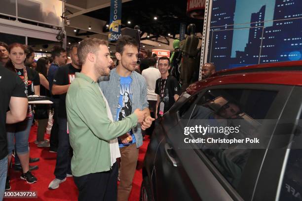 Iain De Caestecker and Jeff Ward of Marvel's Agents of S.H.I.E.L.D. Stop by the Marvel booth to pose with the Hyundai Kona Iron Man Edition at San...