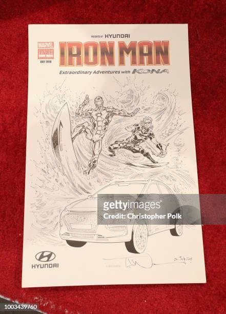 Todd Nauck stops by the Marvel booth to pose with the Hyundai Kona Iron Man Edition at San Diego Comic-Con 2018 at the San Diego Convention Center on...