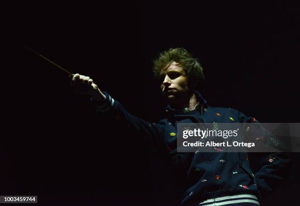Eddie Redmayne speaks onstage at the Warner Bros. 'Fantastic Beasts: The Crimes of Grindelwald' theatrical panel during Comic-Con International 2018...