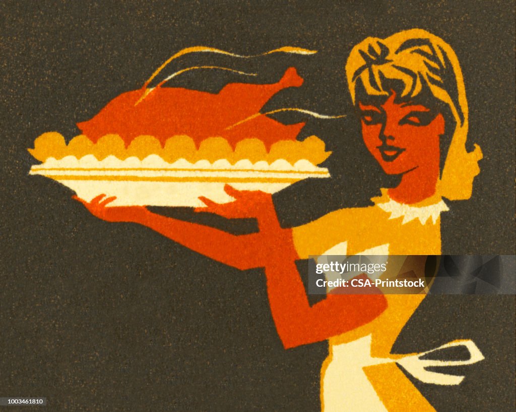 Woman Holding Large Turkey Platter