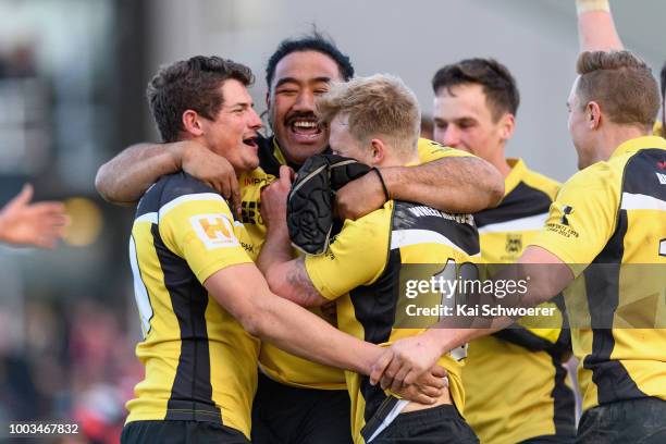 Nathan Ah Kee of New Brighton and his team mates celebrate their win in the Hawkins Metro Premier Trophy Semi Final match between Christchurch FC and...