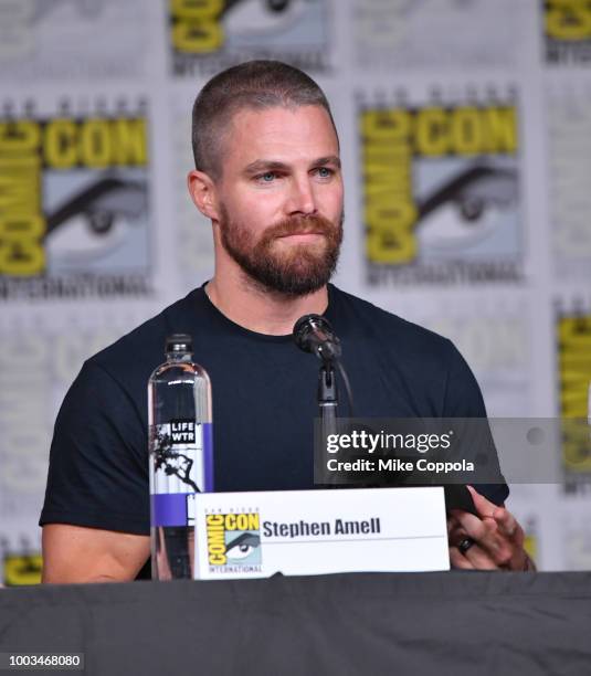 Stephen Amell speaks onstage at the "Arrow" Special Video Presentation and Q&A during Comic-Con International 2018 at San Diego Convention Center on...