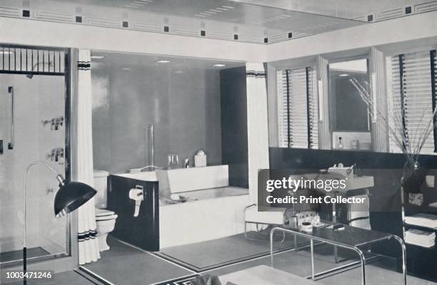 Crane Co. - A black, white, red and grey scheme wth an unglazed ceramic tile floor, oyster-white walls, a crimson, blue and white macarta bath...