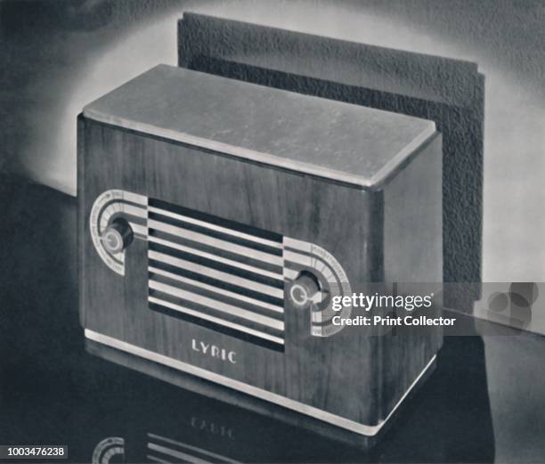 Midget radio cabinet in wood veneer, with aluminum grill and dials, designed by Russel Wright, New York', 1935. From Decorative Art 1935 - Year-Book...