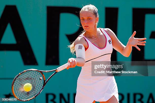 Anna Chakvetadze of Russia plays a forehand during the women's singles first round match between Angelique Kerber of Germany and Anna Chakvetadze of...