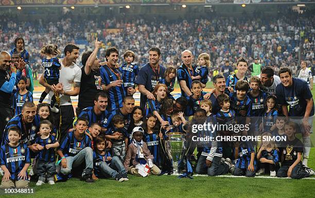 Inter Milan's players celebrate with the trophy after winning the UEFA Champions League final football match Inter Milan against Bayern Munich at the...