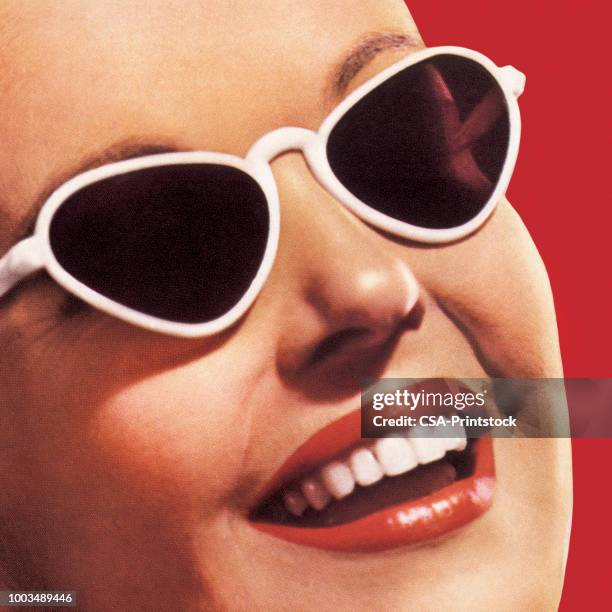 closeup of smiling face with sunglasses - cheerful woman stock illustrations