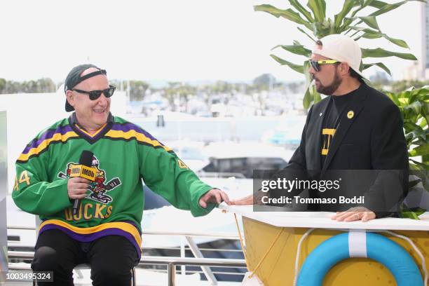 Writer Jeph Loeb and host Kevin Smith attend the #IMDboat At San Diego Comic-Con 2018: Day Three at The IMDb Yacht on July 21, 2018 in San Diego,...