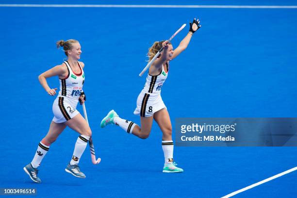 Anne Schroder and Franzisca Hauke of Germany celebrate their side's third goal during the Pool C game between Germany and South Africa of the FIH...