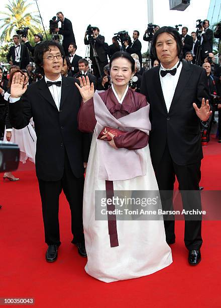 Producer Jun-dong Lee, actress Jeong-hee Yoon of the film "Poetry" attend the Palme d'Or Closing Ceremony held at the Palais des Festivals during the...