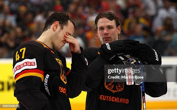 Christoph Ullmann and Alexander Barta of Germany look dejected after losing the IIHF World Championship bronze medal match between Sweden and Germany...