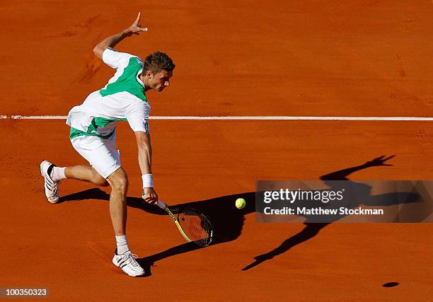 Daniel Brands of Germany plays a backhand during the men's singles first round match between Jo-Wilfried Tsonga of France and Daniel Brands of...