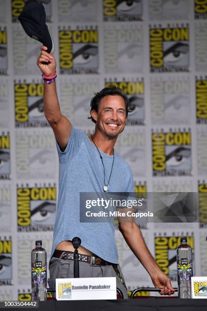 Tom Cavanagh walks onstage at the"The Flash" Special Video Presentation and Q&A during Comic-Con International 2018 at San Diego Convention Center on...