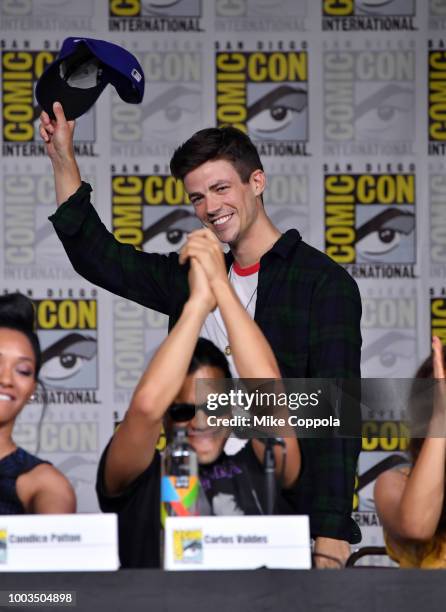 Grant Gustin walks onstage at the"The Flash" Special Video Presentation and Q&A during Comic-Con International 2018 at San Diego Convention Center on...