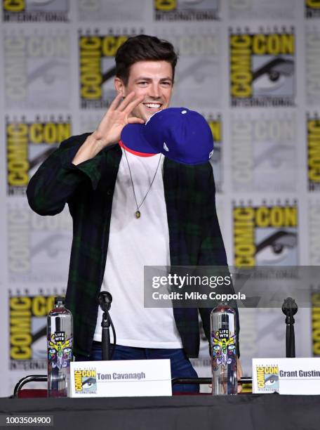 Grant Gustin walks onstage at the"The Flash" Special Video Presentation and Q&A during Comic-Con International 2018 at San Diego Convention Center on...