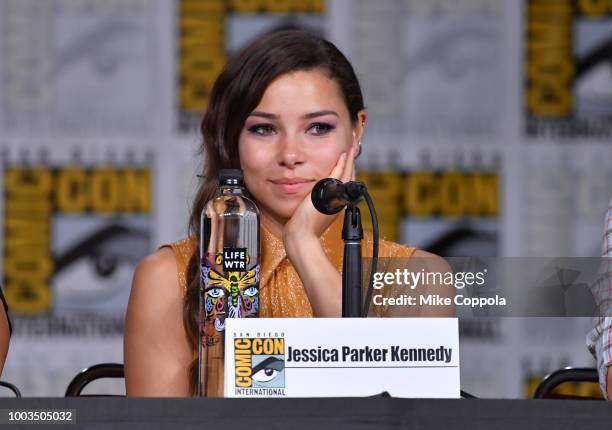 Jessica Parker Kennedy waves onstage at the"The Flash" Special Video Presentation and Q&A during Comic-Con International 2018 at San Diego Convention...