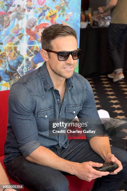 Dylan Bruce puts his gaming skills to the test playing Mario Kart 8 Deluxe on Nintendo Switch at the Variety Studio at Comic-Con 2018 on July 21,...