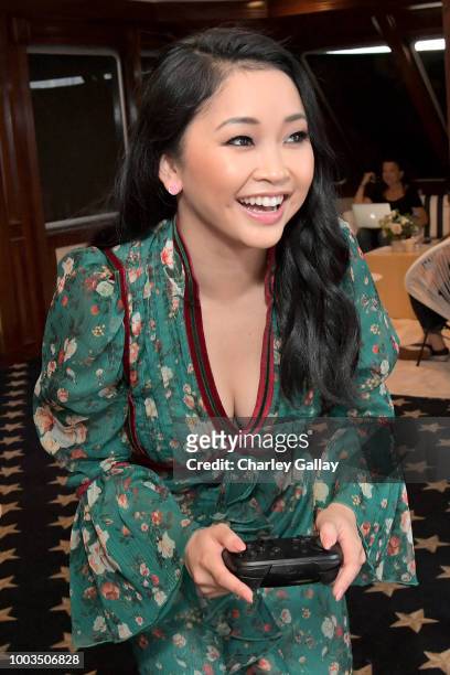 Lana Condor tests her skills on Super Smash Bros. Ultimate for Nintendo Switch at the Variety Studio at Comic-Con 2018 on July 21, 2018 in San Diego,...