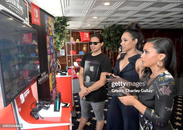 Carlos Valdes, Candice Patton and Danielle Nicolet test their skills on Super Smash Bros. Ultimate for Nintendo Switch at the Variety Studio at...