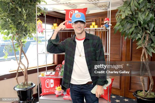 Grant Gustin stops by Nintendo at the Variety Studio to check out the Nintendo Switch with his Flash cast mates at Comic-Con 2018 on July 21, 2018...