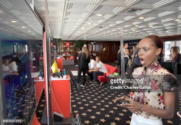 Ashleigh Murray tests her skills on Super Smash Bros. Ultimate for Nintendo Switch at the Variety Studio at Comic-Con 2018 on July 21, 2018 in San...