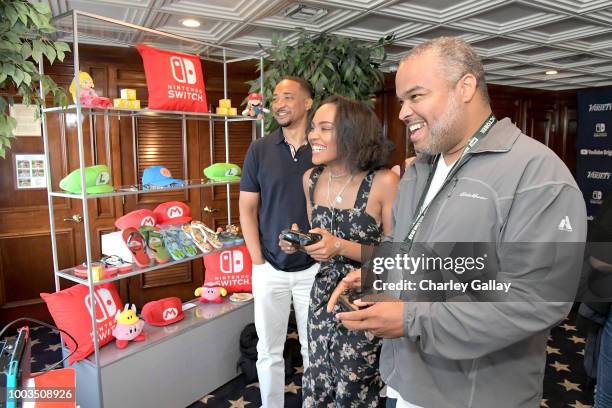 Damon Gupton and China Anne McClain test their skills on Super Smash Bros. Ultimate for Nintendo Switch at the Variety Studio at Comic-Con 2018 on...