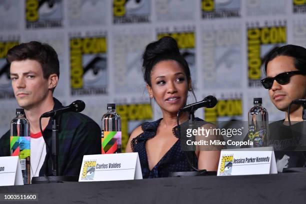 Grant Gustin, Candice Patton and Carlos Valdes speak onstage at the"The Flash" Special Video Presentation and Q&A during Comic-Con International 2018...