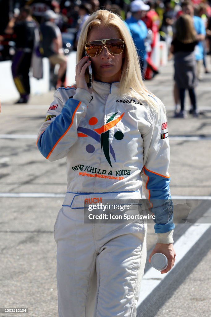 Angela Ruch, driver of the JW Transport, LLC Chevy during pre-race ...