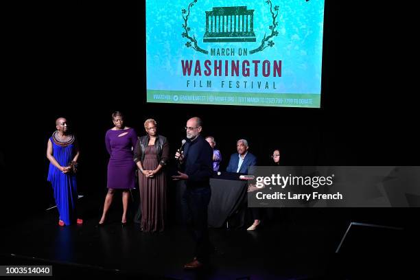 Artistic Director Isisara Bey, Executive Director Samantha Abrams, COO of the Raben Group Joanne Irby, and Founder and President of the Raben Group,...