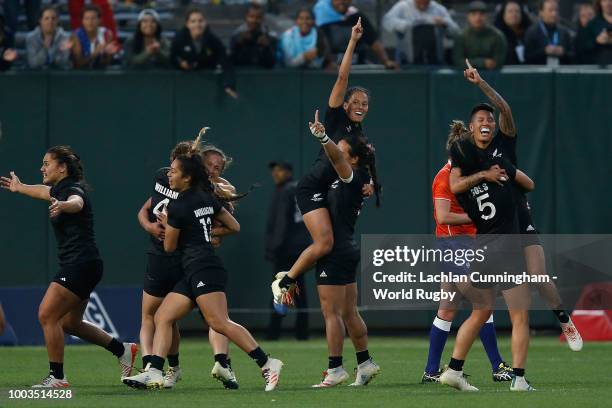 New Zealand players celebrate after winning the Championship match against France to win the 2018 Woman's Rugby World Cup Sevens at AT&T Park on July...