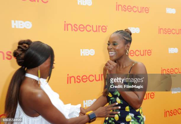 Actors Yvonne Orji and Issa Rae attend HBO's Insecure Block Party at Banc of California Stadium on July 21, 2018 in Los Angeles, California.