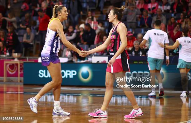 Players shake hands after the Super Netball match between the Thunderbirds and the Lightning at Priceline Stadium on July 22, 2018 in Adelaide,...