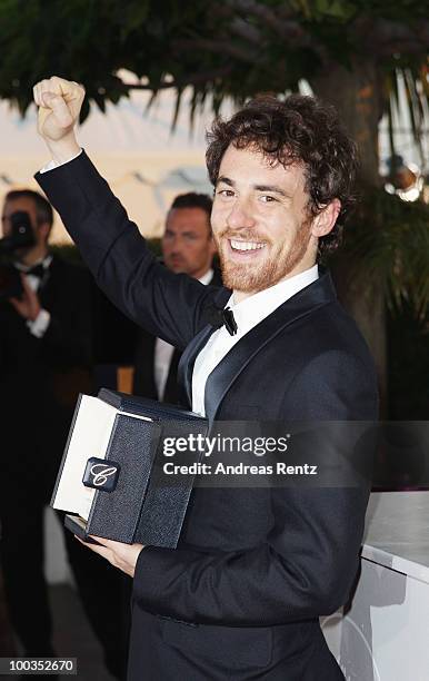 Actor Elio Germano poses with his Best Actor award for his role in 'Our Life' during the Palme d'Or Award Ceremony photocall held at the Palais des...