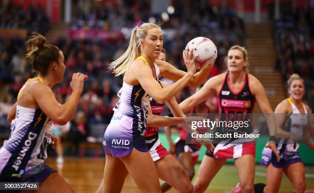 Cara Koenen of the Lightning controls the ball during the Super Netball match between the Thunderbirds and the Lightning at Priceline Stadium on July...