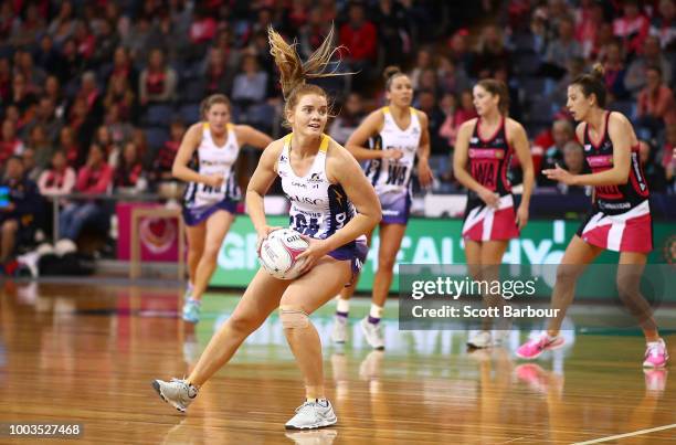 Steph Wood of the Lightning controls the ball during the Super Netball match between the Thunderbirds and the Lightning at Priceline Stadium on July...