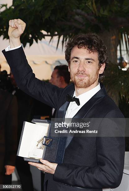 Actor Elio Germano poses with his Best Actor award for his role in 'Our Life' during the Palme d'Or Award Ceremony photocall held at the Palais des...