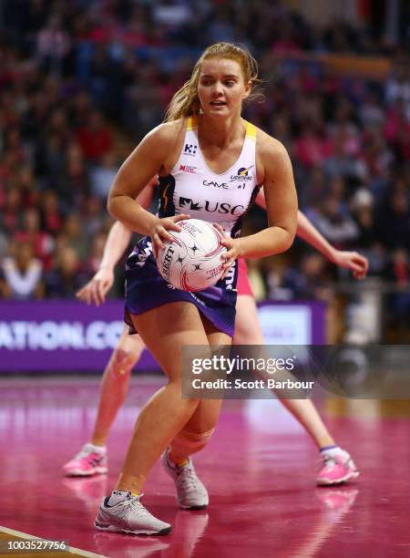 Steph Wood of the Lightning controls the ball during the Super Netball match between the Thunderbirds and the Lightning at Priceline Stadium on July...