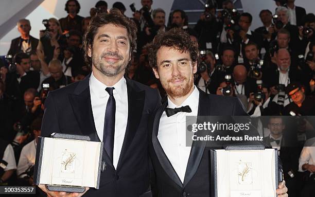 Actors Javier Bardem and Elio Germano pose with their Best Actor awards for during the Palme d'Or Award Ceremony photocall held at the Palais des...