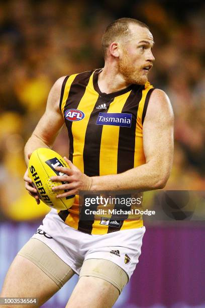 Jarryd Roughead of the Hawks looks upfield during the round 18 AFL match between the Carlton Blues and the Hawthorn Hawks at Etihad Stadium on July...