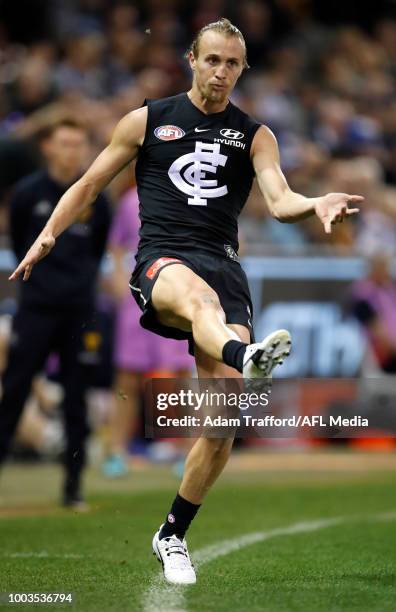 Matt Shaw of the Blues kicks the ball during the 2018 AFL round 18 match between the Carlton Blues and the Hawthorn Hawks at Etihad Stadium on July...