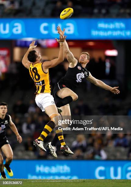 Matthew Lobbe of the Blues in his first game as a Blue competes in a ruck contest with Jonathon Ceglar of the Hawks during the 2018 AFL round 18...