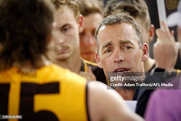 Alastair Clarkson, Senior Coach of the Hawks addresses his players during the 2018 AFL round 18 match between the Carlton Blues and the Hawthorn...