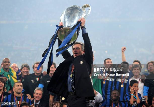 Jose Mourinho the Inter Milan coach holds the trophy aloft after winning the UEFA Champions League Final match between FC Bayern Muenchen and Inter...