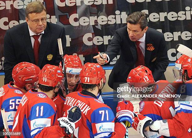 Russian head coach Vyacheslav Bykov and his assistant Igor Zakharkin talks to Russian players during the IIHF Ice Hockey World Championship final...