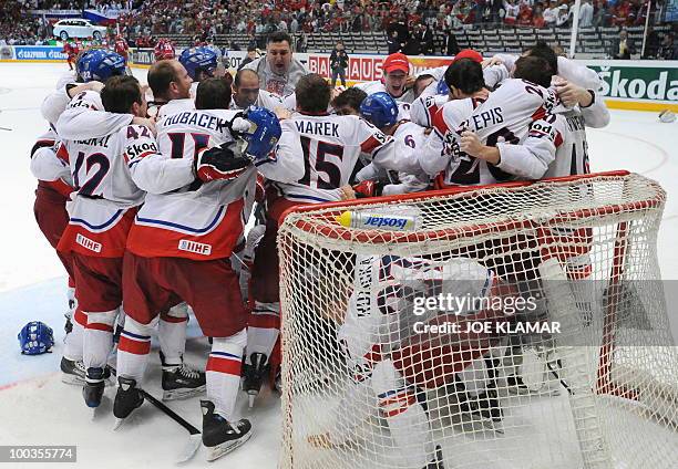 Czech Republic's players celebrate after the IIHF Ice Hockey World Championship final match Russia vs Czech Republic in the western German city of...