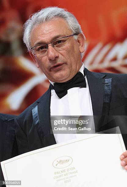 Serge Avedikian poses with his Short Film Palme d'Or Award during the Palme d'Or Award Ceremony held at the Palais des Festivals during the 63rd...