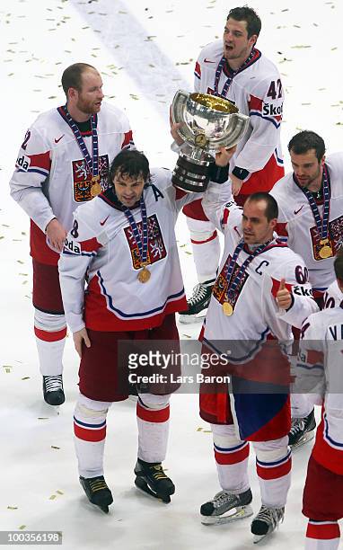 Jaromir Jagr and Tomas Rolinek of Czech Republic lift the trophy after winning the IIHF World Championship gold medal match between Russia and Czech...