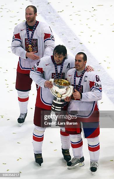 Jaromir Jagr and Tomas Rolinek of Czech Republic lift the trophy after winning the IIHF World Championship gold medal match between Russia and Czech...